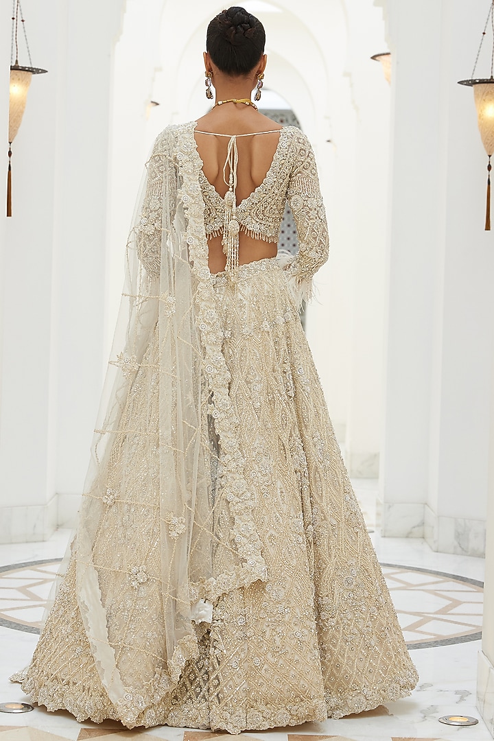 Ivory Net Sequins & Crystal Embroidered Bridal Bridal Lehenga Set by NITIKA GUJRAL at Pernia's Pop Up Shop