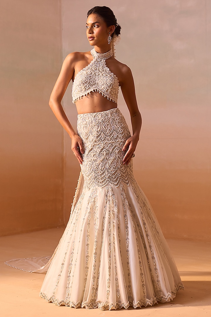 Ivory Net Crystal & Pearl Embellished Fishtail Skirt Set by NITIKA GUJRAL at Pernia's Pop Up Shop