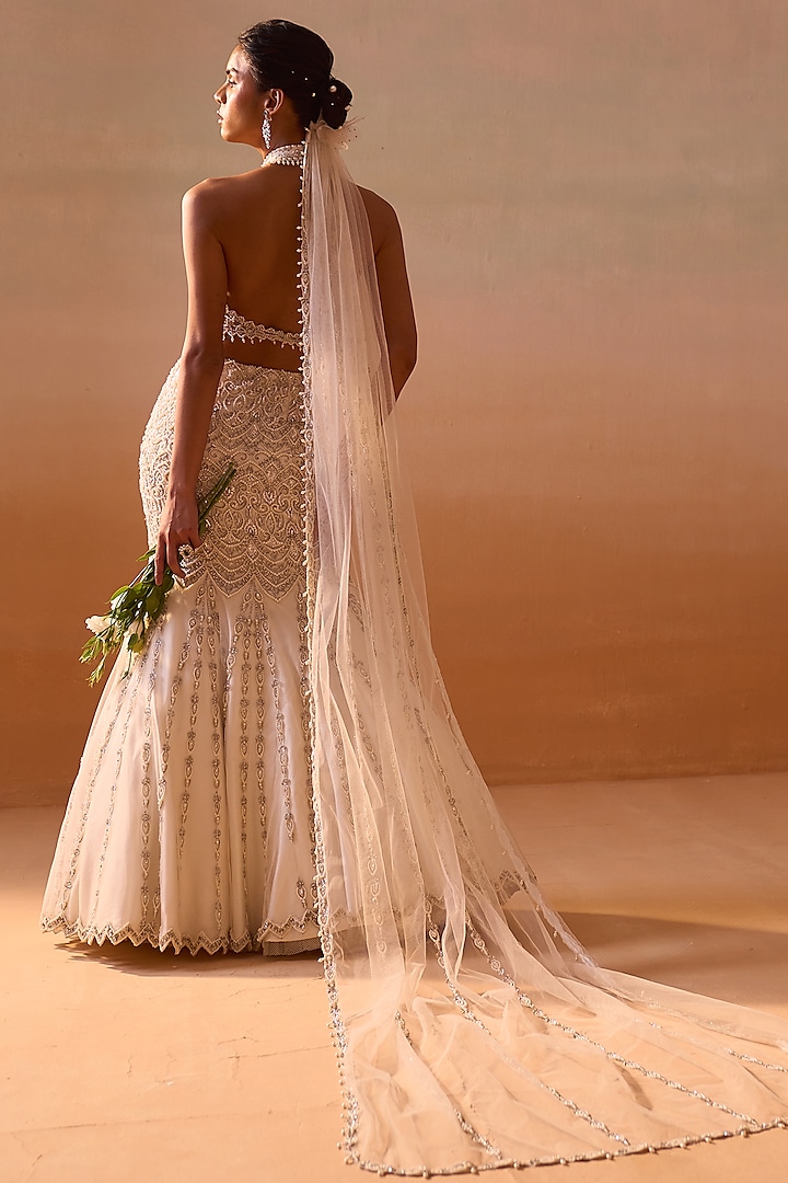 Ivory Net Crystal & Pearl Embellished Fishtail Skirt Set by NITIKA GUJRAL at Pernia's Pop Up Shop