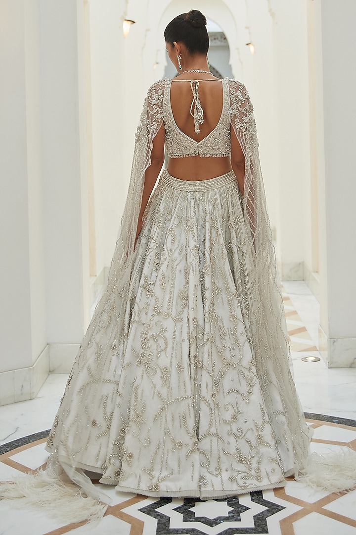 Ivory Net Beads & Sequins Embroidered Bridal Bridal Lehenga Set by NITIKA GUJRAL at Pernia's Pop Up Shop