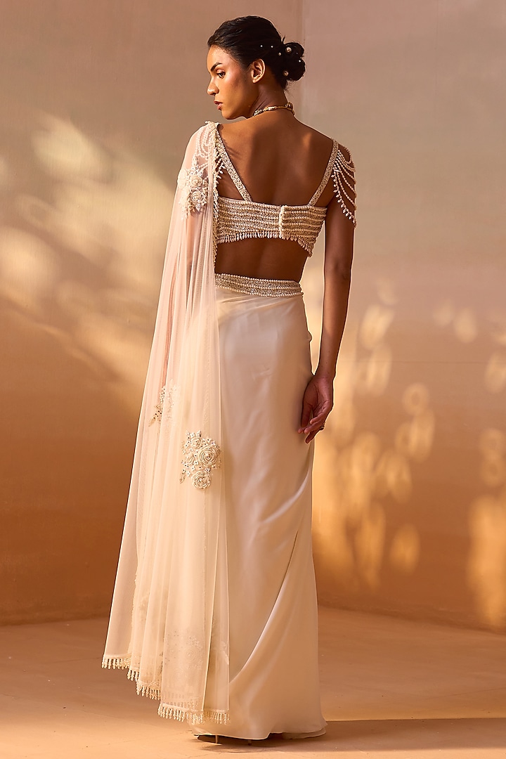 Ivory Satin Pearl Work Pre-Draped Wedding Saree Set by NITIKA GUJRAL at Pernia's Pop Up Shop