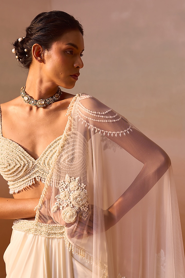 Ivory Satin Pearl Work Pre-Draped Wedding Saree Set by NITIKA GUJRAL at Pernia's Pop Up Shop