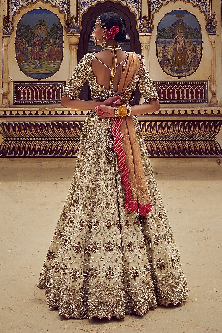 Gold Tissue Dabka & Crystal Embroidered Bridal Lehenga Set by NITIKA GUJRAL at Pernia's Pop Up Shop