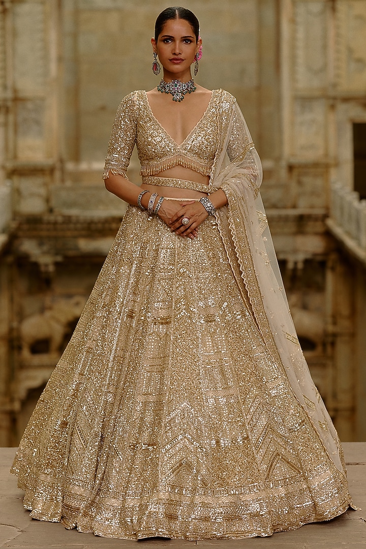 Gold Net Sequins Embellished Bridal Lehenga Set by NITIKA GUJRAL at Pernia's Pop Up Shop