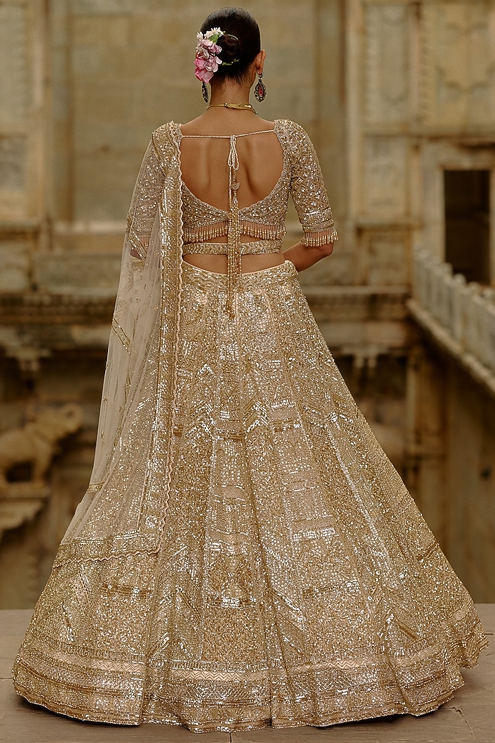Gold Net Sequins Embellished Bridal Lehenga Set by NITIKA GUJRAL at Pernia's Pop Up Shop