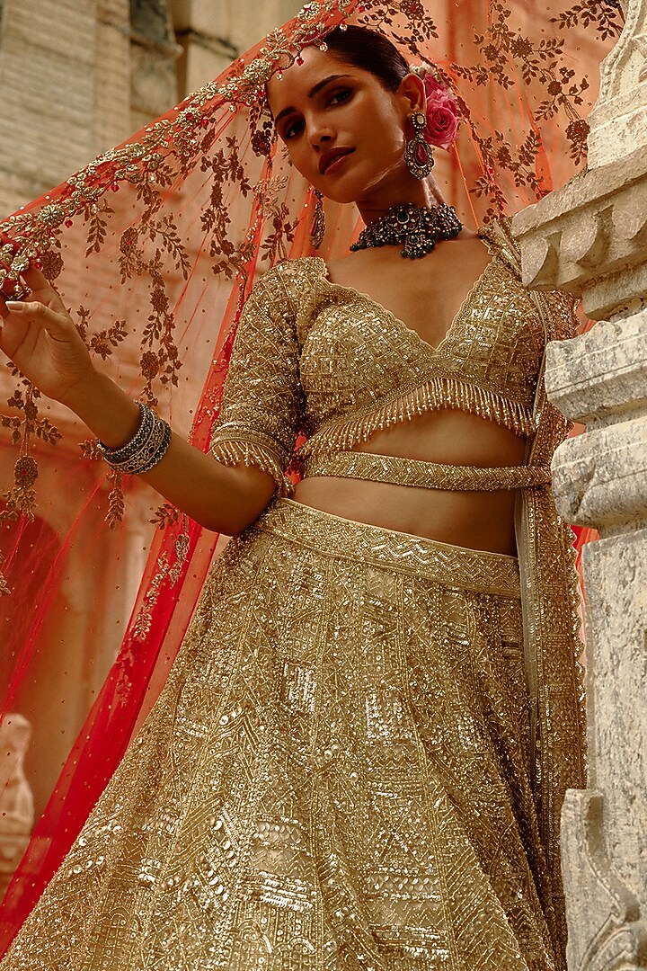 Gold Net Sequins Embellished Bridal Lehenga Set by NITIKA GUJRAL at Pernia's Pop Up Shop