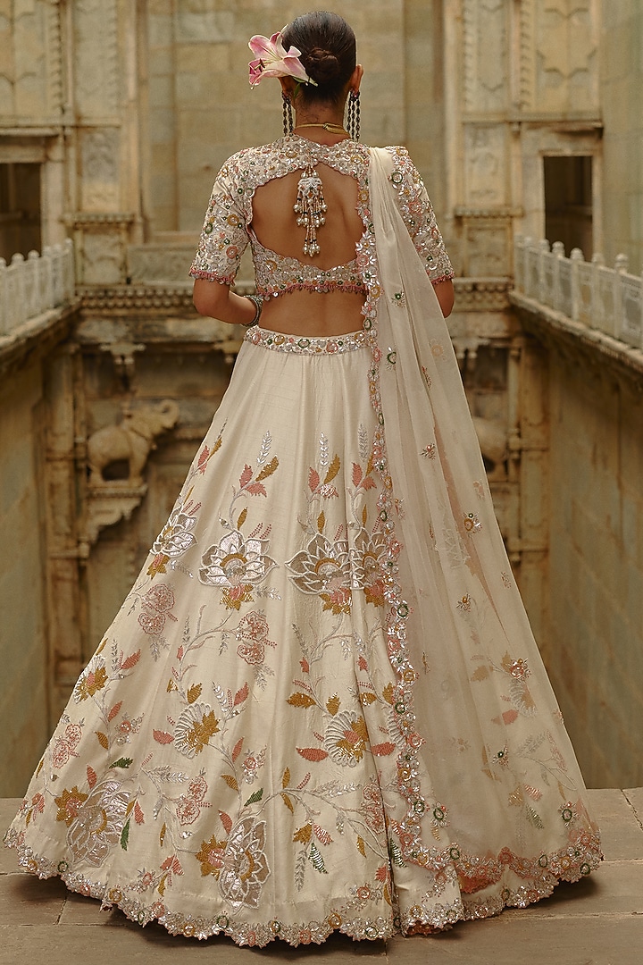 Cream Raw Silk Sequins Work Bridal Lehenga Set by NITIKA GUJRAL at Pernia's Pop Up Shop