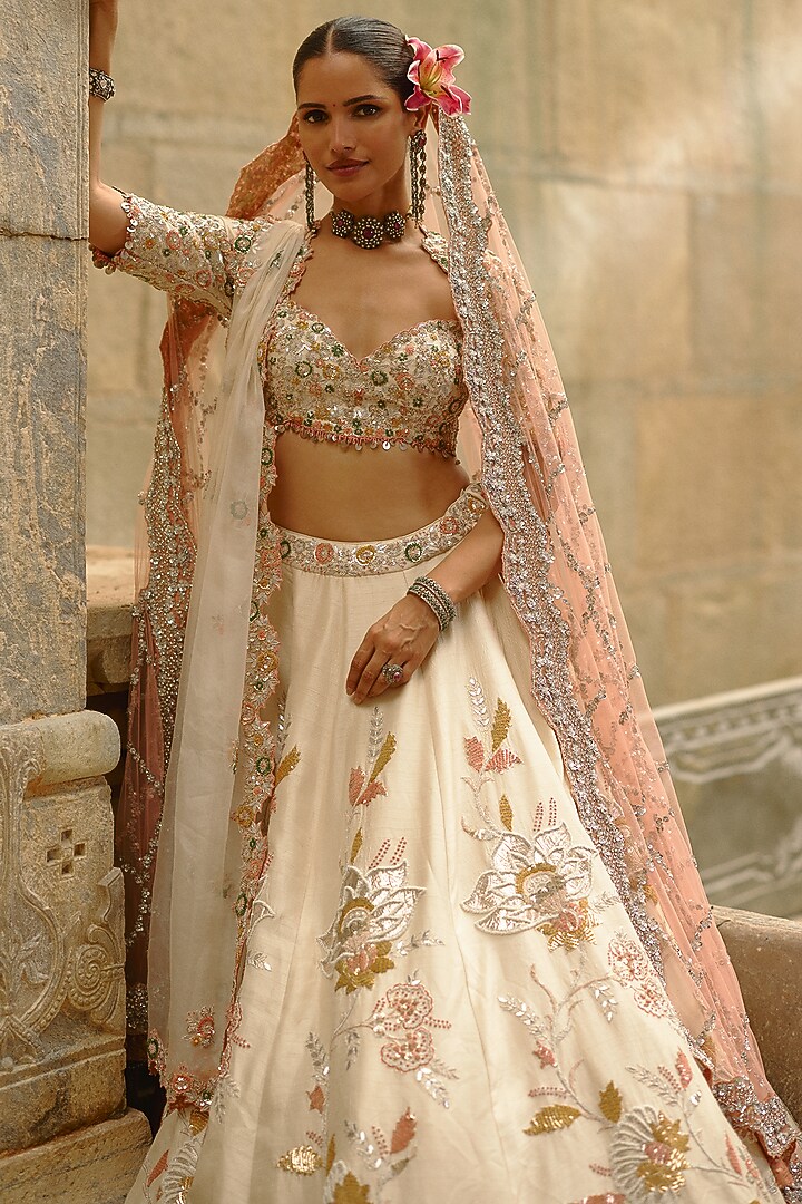 Cream Raw Silk Sequins Work Bridal Lehenga Set by NITIKA GUJRAL at Pernia's Pop Up Shop