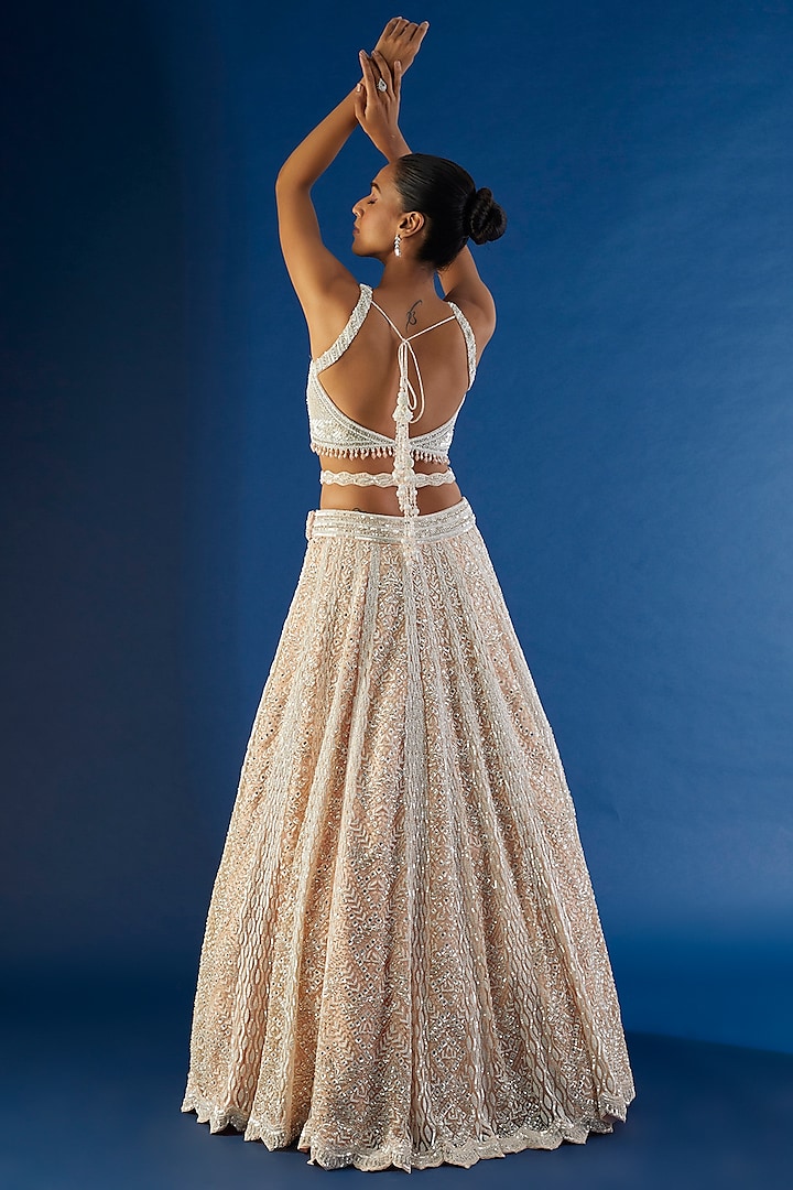 Peach Tulle Sequins Embroidered Bridal Lehenga Set by NITIKA GUJRAL at Pernia's Pop Up Shop