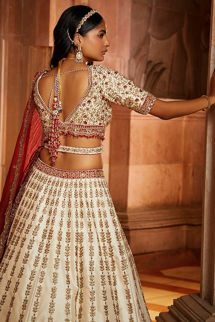 Ivory Taffeta Embroidered Bridal Bridal Lehenga Set by NITIKA GUJRAL at Pernia's Pop Up Shop