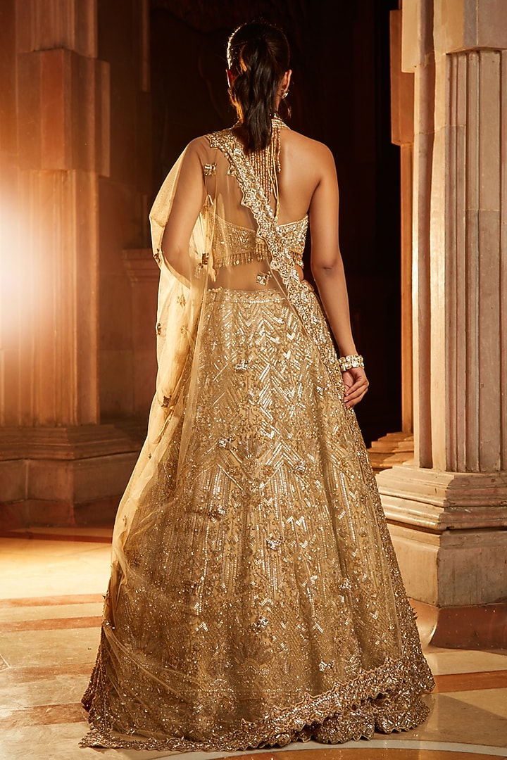 Gold Tulle Embroidered Bridal Lehenga Set by NITIKA GUJRAL at Pernia's Pop Up Shop