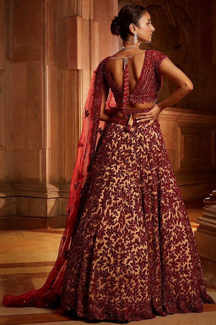Nude & Deep Red Tulle Sequins Embroidered Bridal Lehenga Set by NITIKA GUJRAL at Pernia's Pop Up Shop
