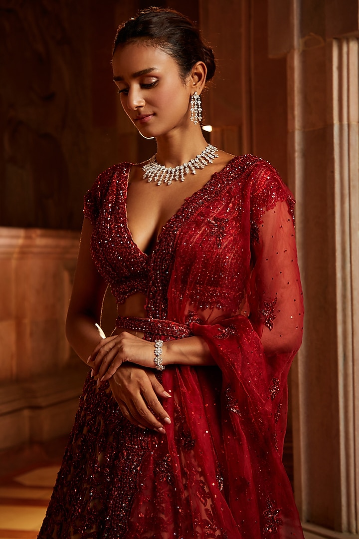 Nude & Deep Red Tulle Sequins Embroidered Bridal Lehenga Set by NITIKA GUJRAL at Pernia's Pop Up Shop