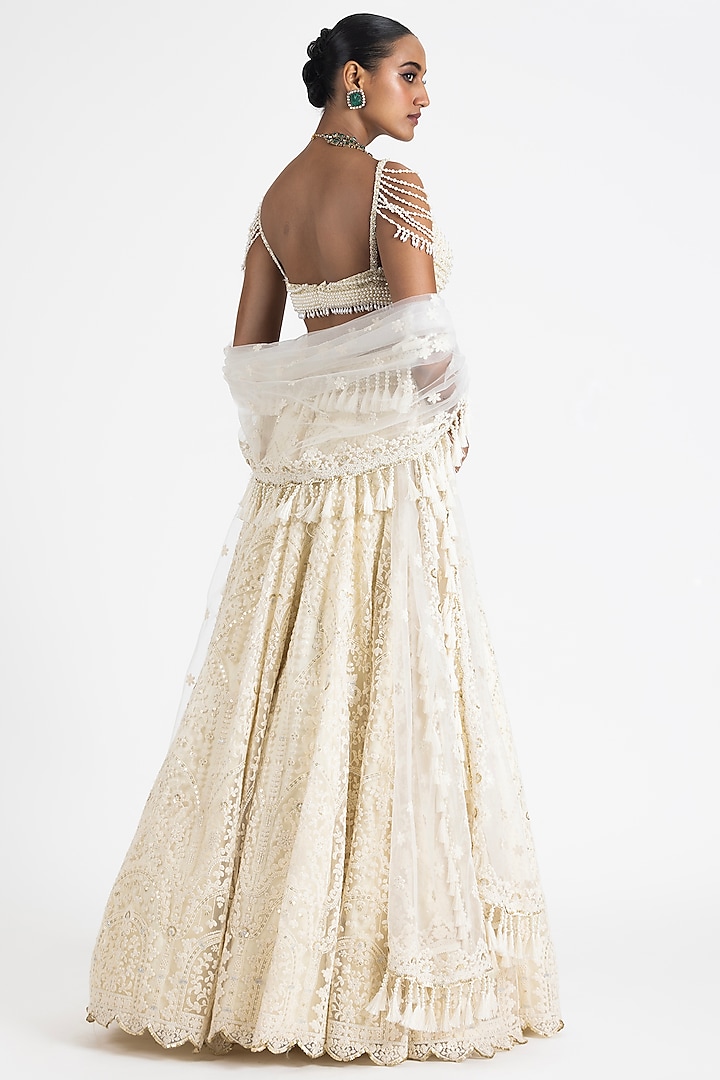Off-White Net & Satin Resham Embroidered Wedding Lehenga Set by NITIKA GUJRAL at Pernia's Pop Up Shop
