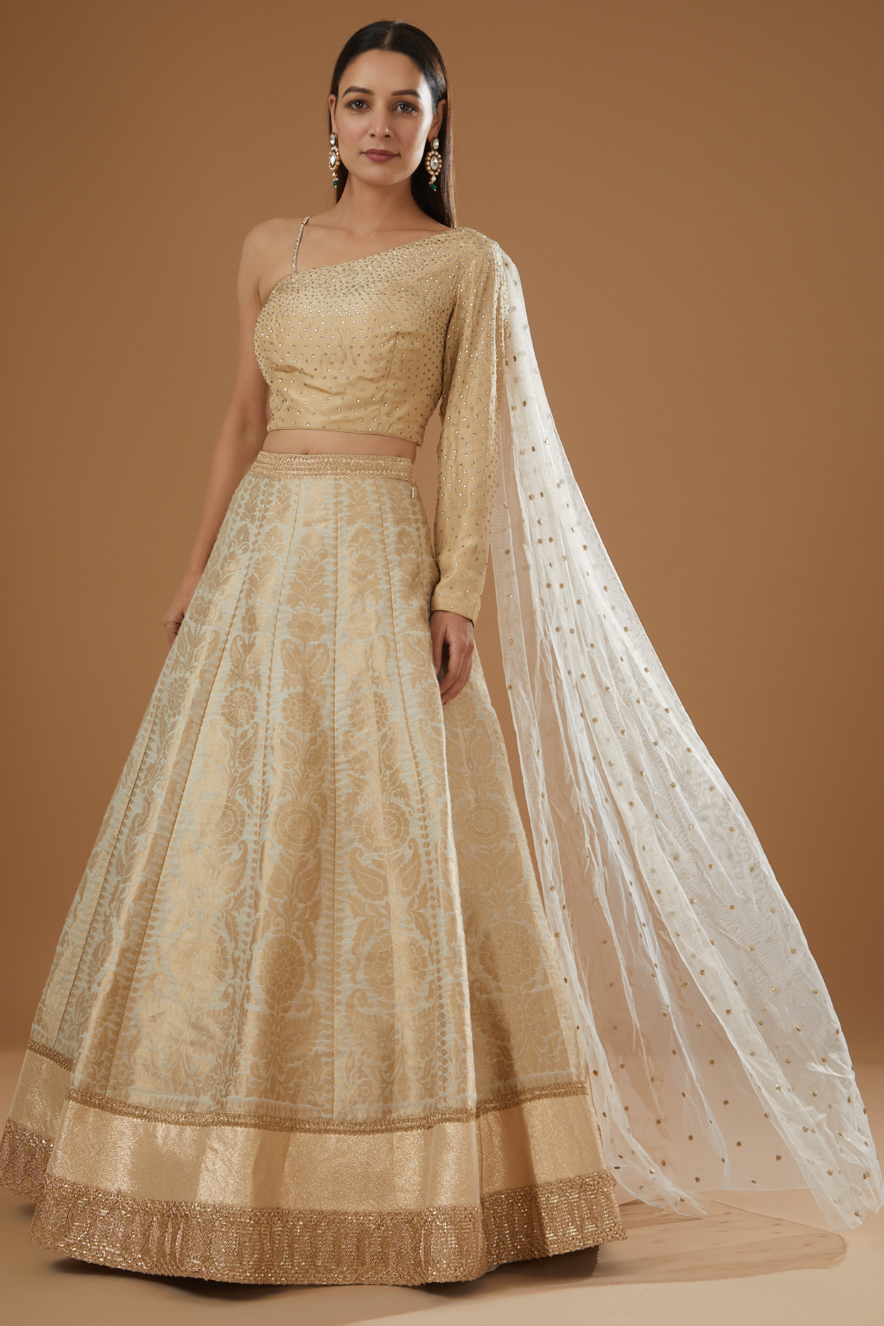 Cream Brocade & Net Wedding Lehenga Set by NITIKA GUJRAL at Pernia's Pop Up Shop