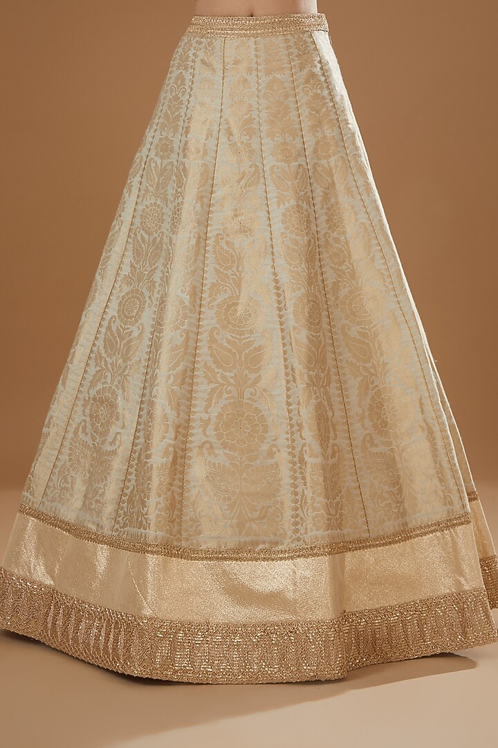 Cream Brocade & Net Wedding Lehenga Set by NITIKA GUJRAL at Pernia's Pop Up Shop