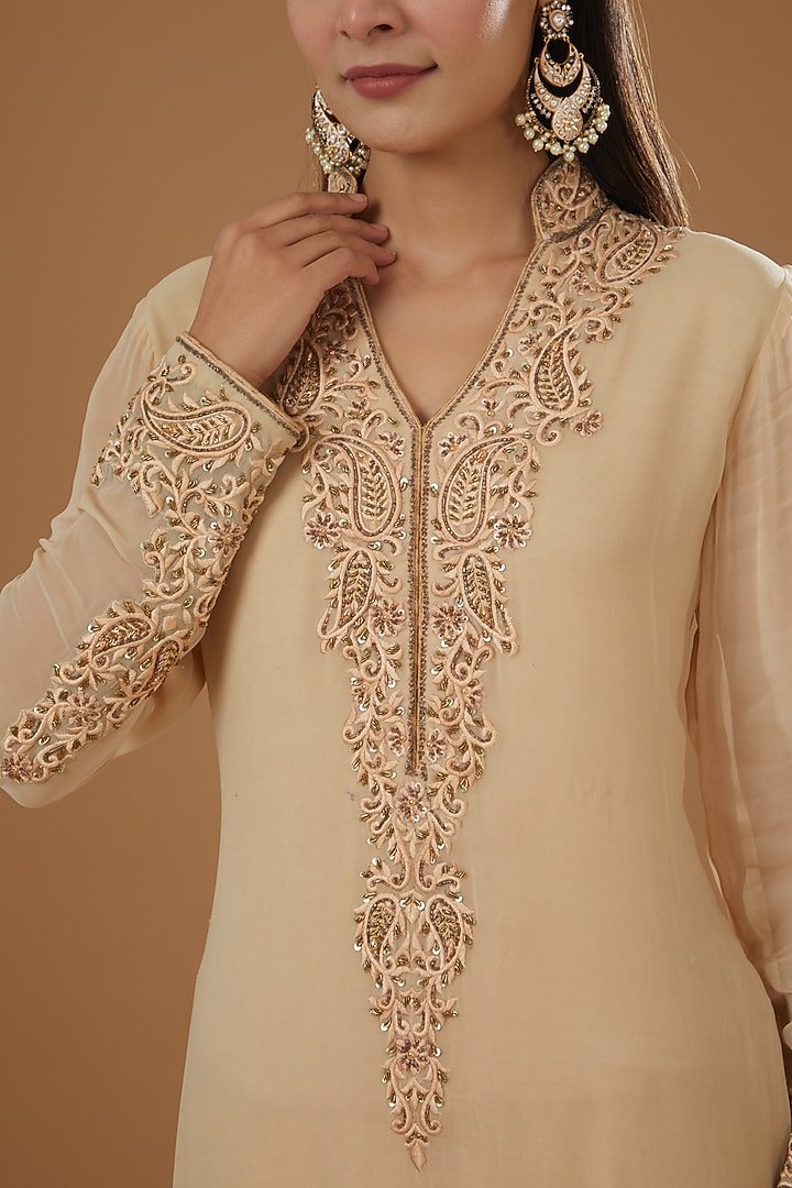 Beige Peach Georgette & Brocade Kurta Set by NITIKA GUJRAL at Pernia's Pop Up Shop