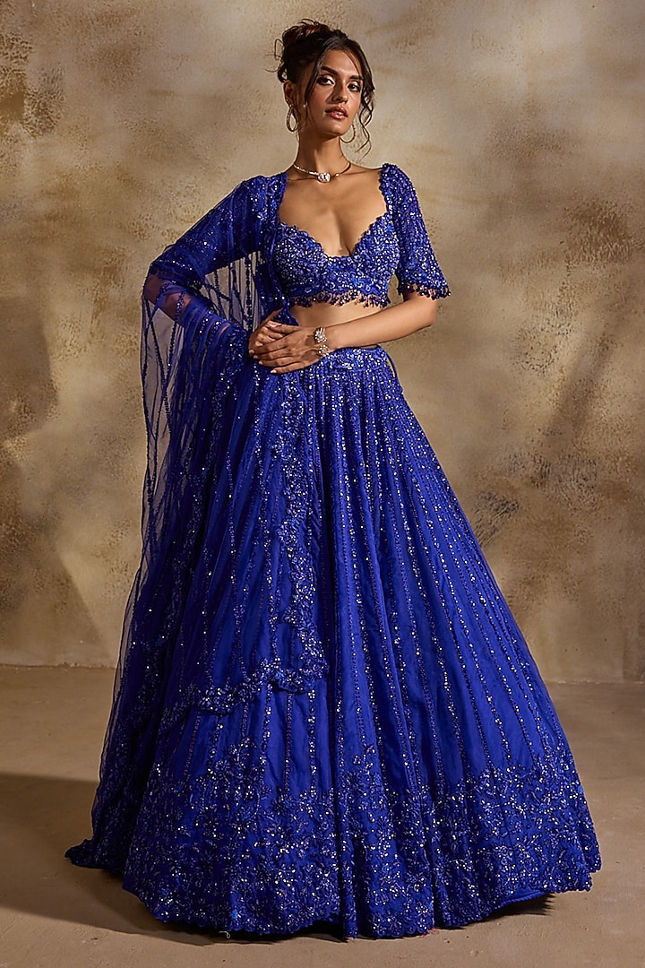 Electric Blue Tulle Crystal Embroidered Bridal Lehenga Set by NITIKA GUJRAL at Pernia's Pop Up Shop