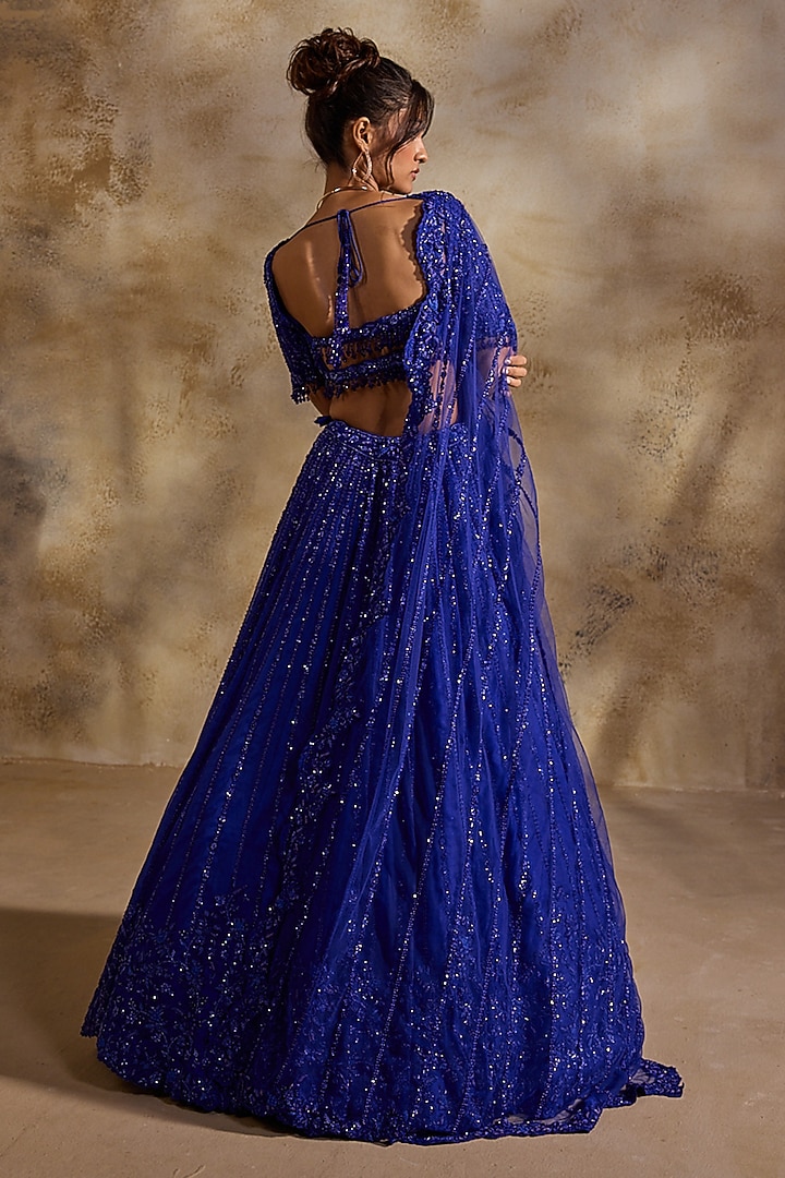 Electric Blue Tulle Crystal Embroidered Bridal Lehenga Set by NITIKA GUJRAL at Pernia's Pop Up Shop