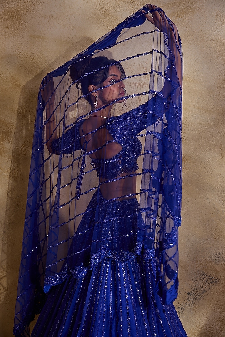 Electric Blue Tulle Crystal Embroidered Bridal Lehenga Set by NITIKA GUJRAL at Pernia's Pop Up Shop