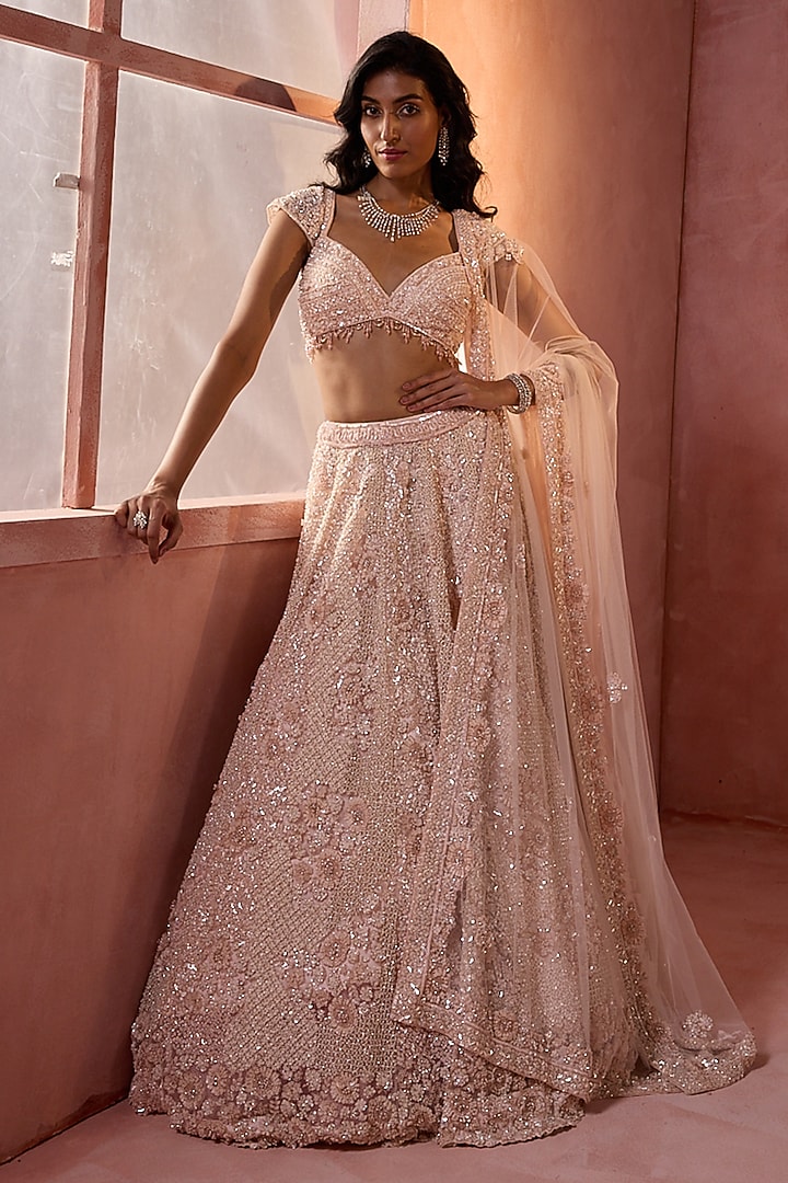 Blush Pink Tulle Sequins Embroidered Bridal Lehenga Set by NITIKA GUJRAL at Pernia's Pop Up Shop