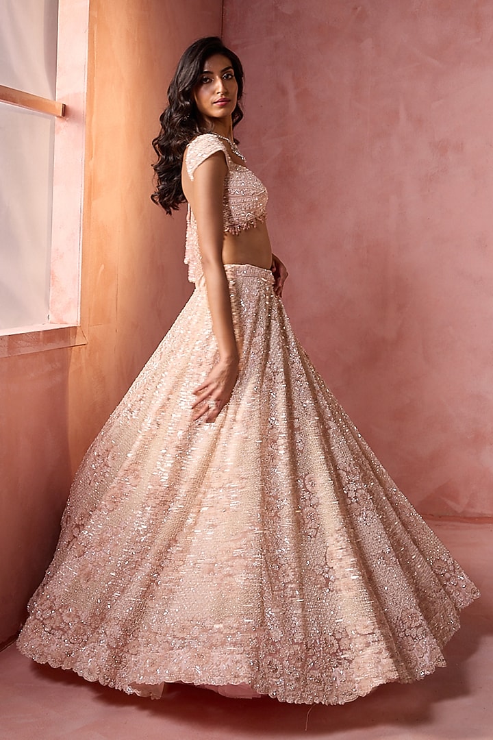Blush Pink Tulle Sequins Embroidered Bridal Lehenga Set by NITIKA GUJRAL at Pernia's Pop Up Shop