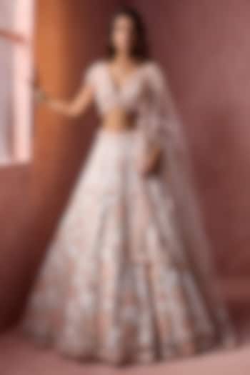 White Net Floral Applique Embroidered Bridal Lehenga Set by NITIKA GUJRAL at Pernia's Pop Up Shop