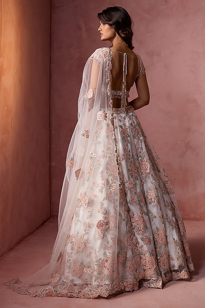 White Net Floral Applique Embroidered Bridal Lehenga Set by NITIKA GUJRAL at Pernia's Pop Up Shop