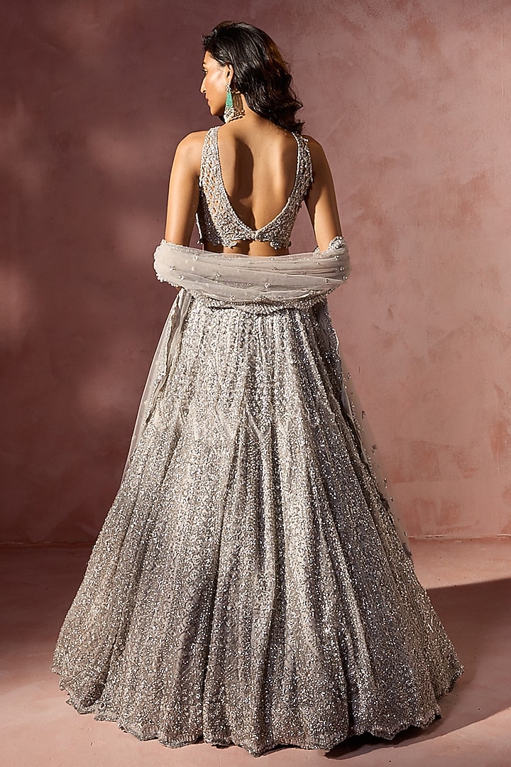 Silver Grey Net Metallic Beads Embroidered Bridal Lehenga Set by NITIKA GUJRAL at Pernia's Pop Up Shop