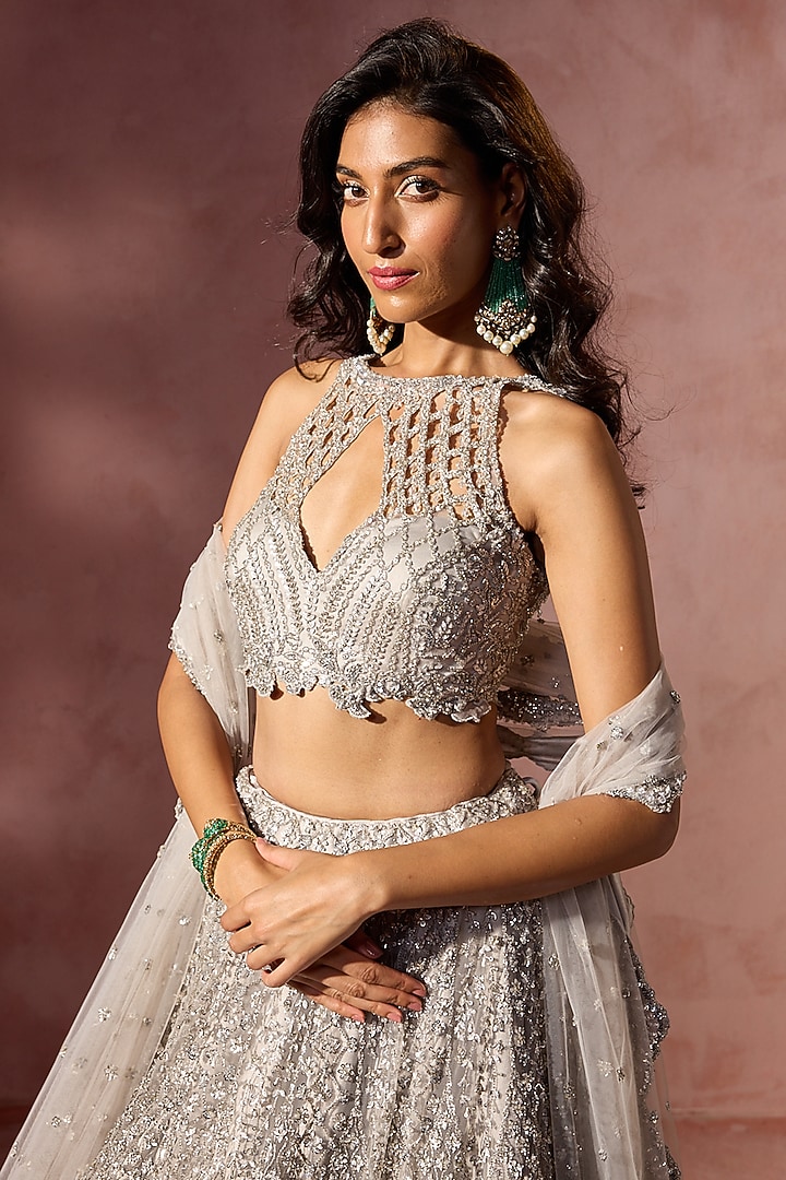 Silver Grey Net Metallic Beads Embroidered Bridal Lehenga Set by NITIKA GUJRAL at Pernia's Pop Up Shop