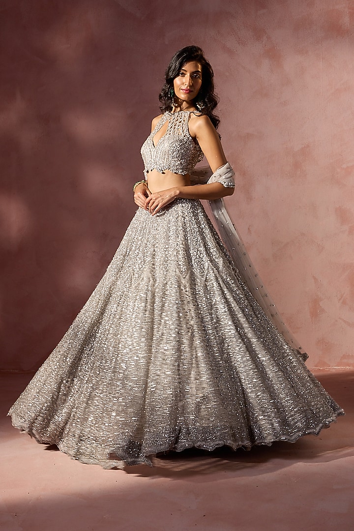 Silver Grey Net Metallic Beads Embroidered Bridal Lehenga Set by NITIKA GUJRAL at Pernia's Pop Up Shop