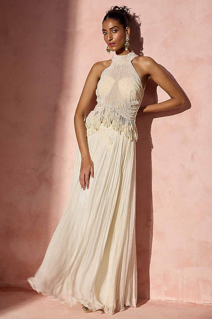 Ivory Chiffon Pleated Skirt Set by NITIKA GUJRAL at Pernia's Pop Up Shop