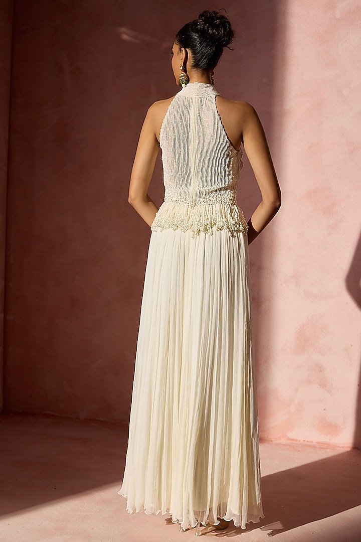 Ivory Chiffon Pleated Skirt Set by NITIKA GUJRAL at Pernia's Pop Up Shop