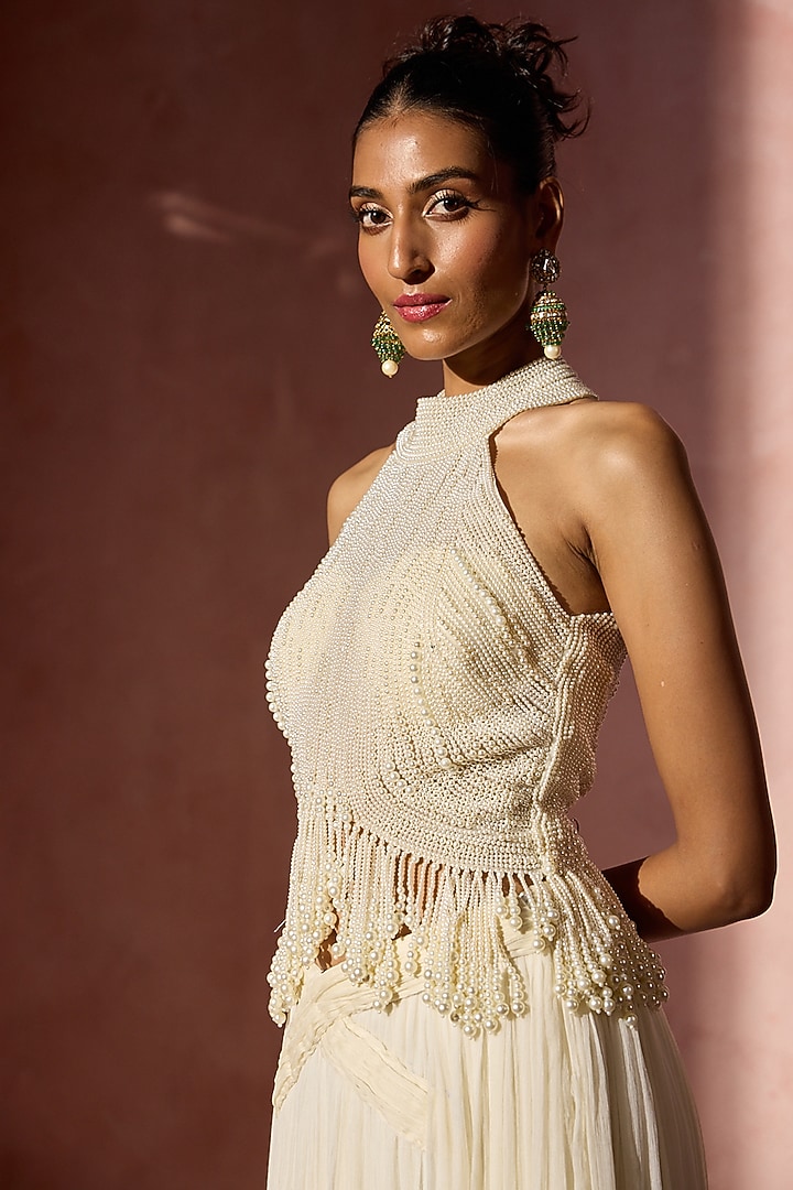 Ivory Chiffon Pleated Skirt Set by NITIKA GUJRAL at Pernia's Pop Up Shop