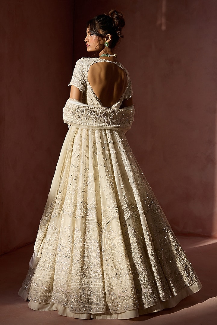 Ivory Organza Sequins Embroidered Jacket Bridal Lehenga Set by NITIKA GUJRAL at Pernia's Pop Up Shop