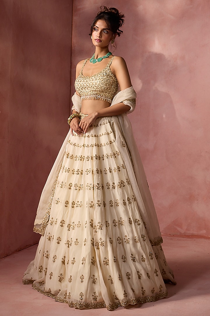Cream Organza Sequins & Crystal Embroidered Bridal Lehenga Set by NITIKA GUJRAL at Pernia's Pop Up Shop
