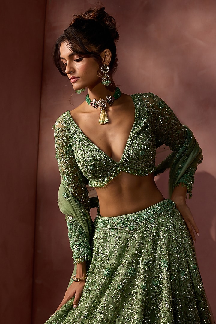 Sage Green Net Sequins Embroidered Bridal Lehenga Set by NITIKA GUJRAL at Pernia's Pop Up Shop