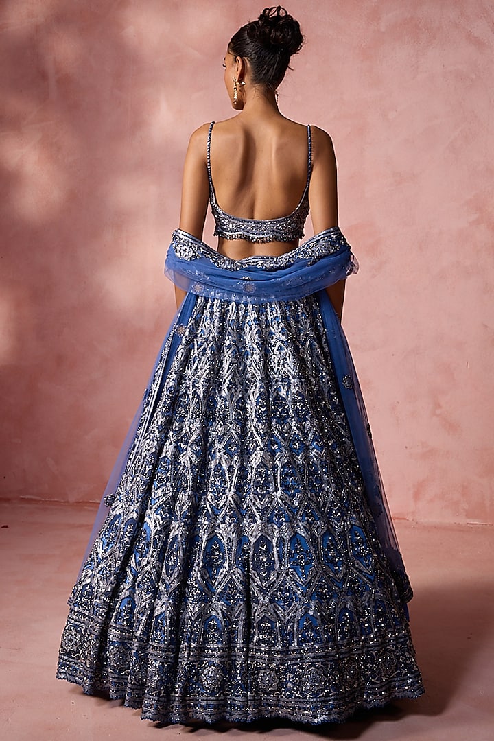 Petrol Blue Net Cutdana & Beads Embroidered Bridal Lehenga Set by NITIKA GUJRAL at Pernia's Pop Up Shop