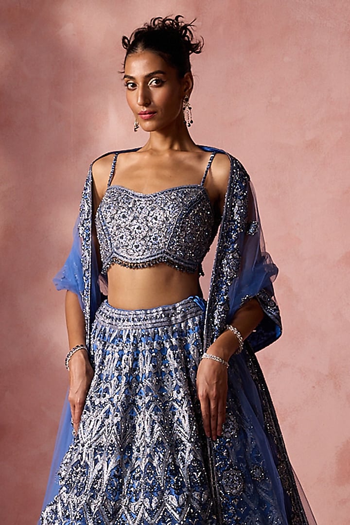 Petrol Blue Net Cutdana & Beads Embroidered Bridal Lehenga Set by NITIKA GUJRAL at Pernia's Pop Up Shop