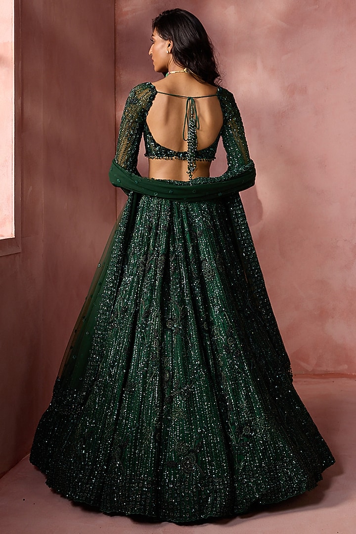 Bottle Green Net Beads & Sequins Embroidered Bridal Lehenga Set by NITIKA GUJRAL at Pernia's Pop Up Shop