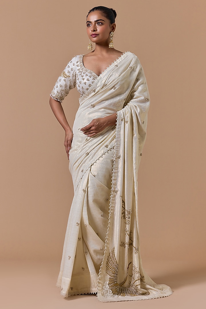 Cream & Gold Georgette Lurex Sequins Embroidered Reception Saree Set by NITIKA GUJRAL at Pernia's Pop Up Shop