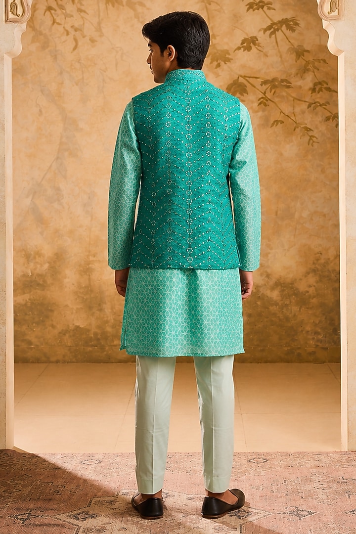 Teal Raw Silk Resham & Mirror Embroidered Bundi Jacket Set For Boys by Nitika Gujral Kids at Pernia's Pop Up Shop