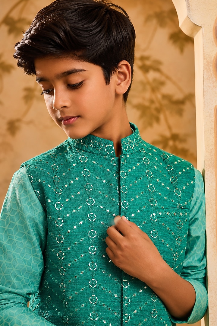 Teal Raw Silk Resham & Mirror Embroidered Bundi Jacket Set For Boys by Nitika Gujral Kids at Pernia's Pop Up Shop