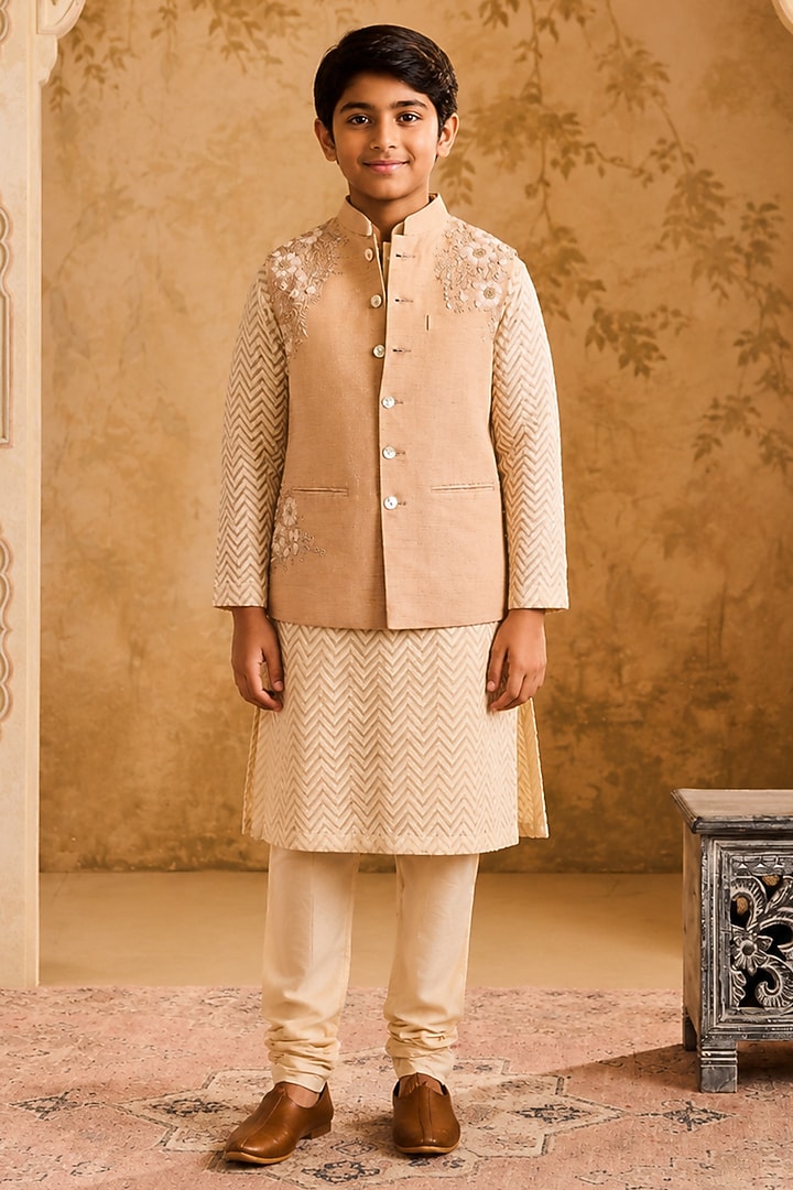 Beige Linen 3D Floral Embroidered Bundi Jacket Set For Boys by Nitika Gujral Kids at Pernia's Pop Up Shop