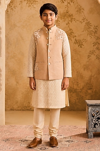 Beige Linen 3D Floral Embroidered Bundi Jacket Set For Boys by Nitika Gujral Kids