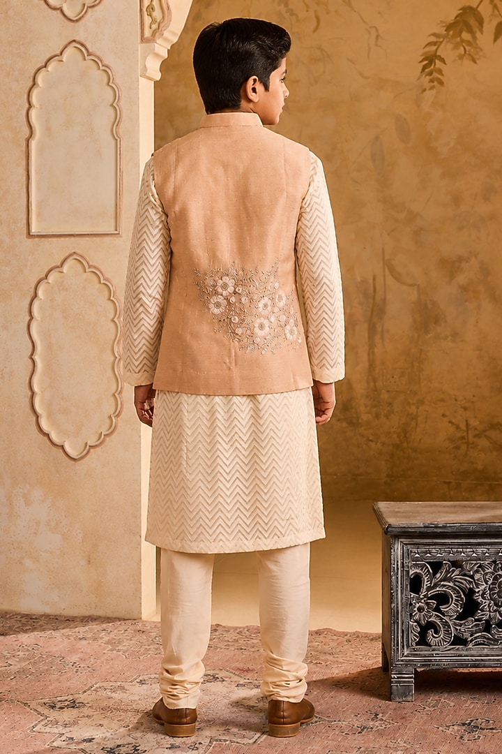 Beige Linen 3D Floral Embroidered Bundi Jacket Set For Boys by Nitika Gujral Kids at Pernia's Pop Up Shop