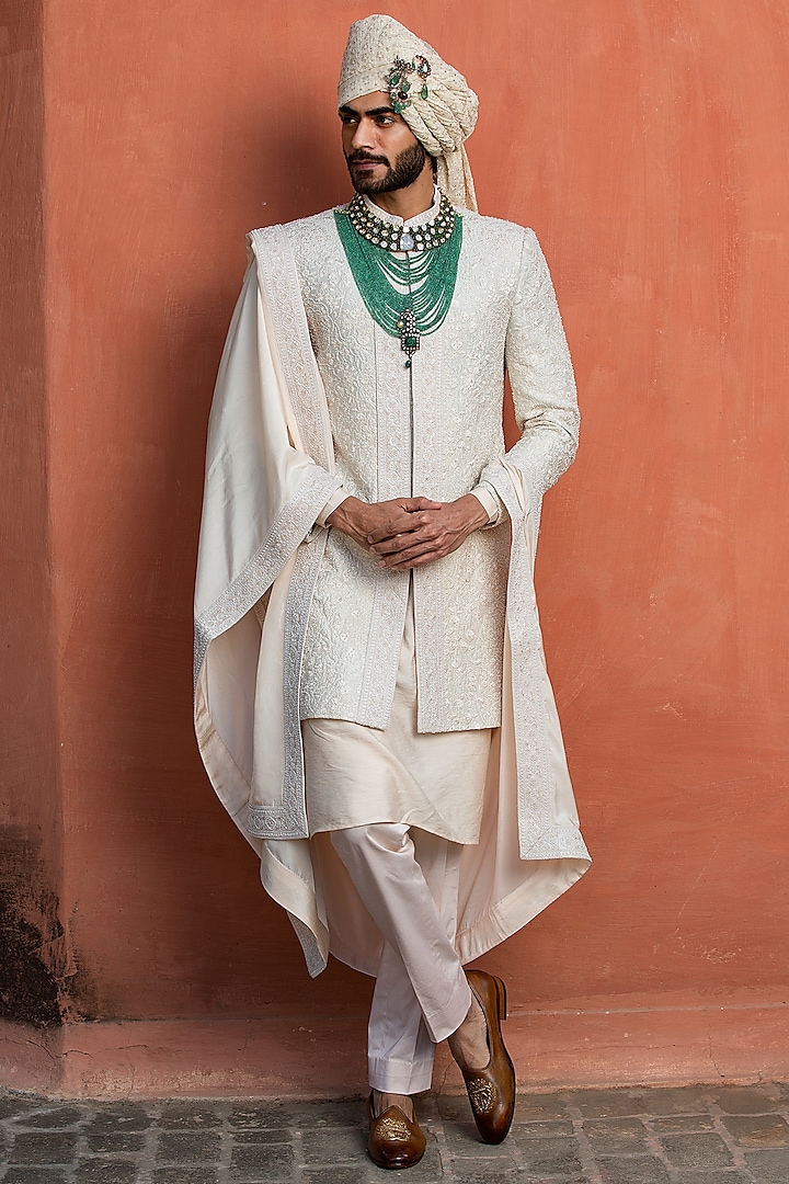 Ivory Raw Silk Embroidered Groom Sherwani Set by NITIKA GUJRAL MEN at Pernia's Pop Up Shop