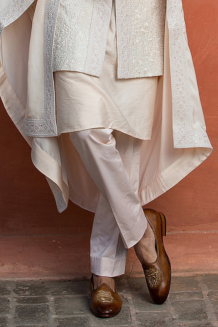 Ivory Raw Silk Embroidered Groom Sherwani Set by NITIKA GUJRAL MEN at Pernia's Pop Up Shop