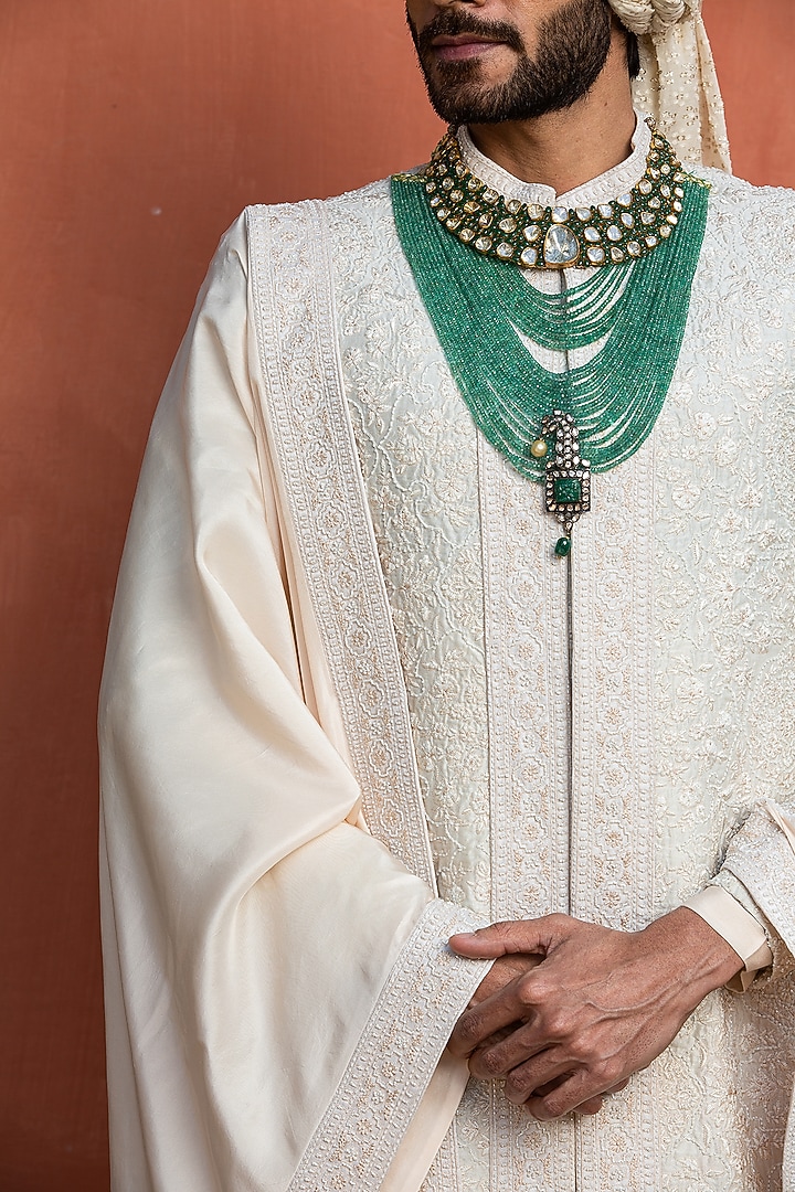 Ivory Raw Silk Embroidered Groom Sherwani Set by NITIKA GUJRAL MEN at Pernia's Pop Up Shop