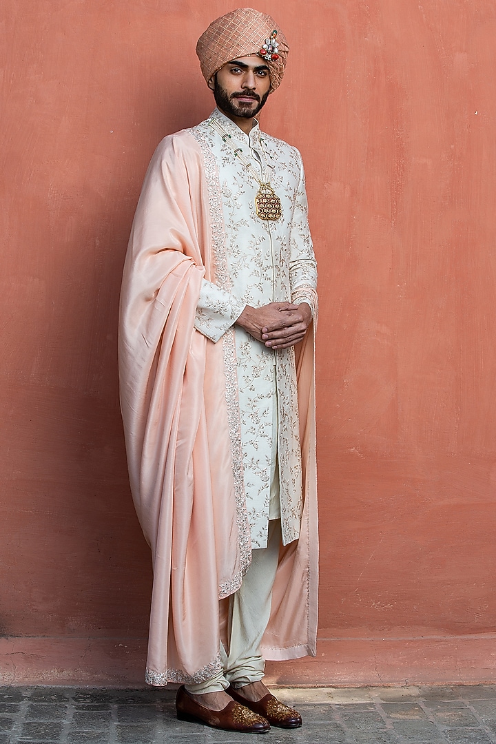 Ivory Raw Silk Embroidered Groom Sherwani Set by NITIKA GUJRAL MEN at Pernia's Pop Up Shop
